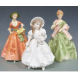 Five porcelain figures including Royal Doulton Mask Seller, Coalport and Royal Worcester examples,