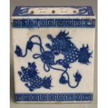 A 19th/20thC Chinese blue and white pierced porcelain pillow, 15x13x7cm.
