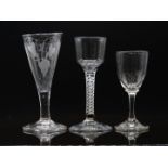 Three 18th/19thC drinking glasses comprising one with cotton twist stem and ogee shaped bowl, one