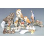 A collection of bird and animal figures including Copenhagen kingfisher and gull, two Beswick
