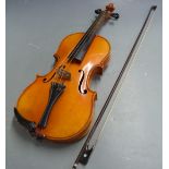 Unlabelled 20thC violin with two piece 35.5cm back, in hand carrying case with 1930s music