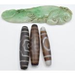 Three Tibetan beads (6cm) and a hardstone carving of bats, 10 x 3cm