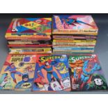 Thirty-one super hero annuals including The Phantom, Superman, Batman, Super Adventure, Super DC,