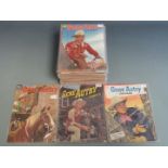Thirty-eight Dell Gene Autry comic books.