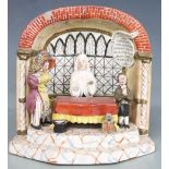 A 19thC Staffordshire figural group The Marriage Act with integral script "The New Marriage Act,