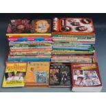 Fifty-five TV related annuals and books including Man From UNCLE, Magic Roundabout, Mission