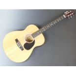 Elevation W-100-N-A acoustic guitar in lacquered finish fitted with six steel strings and individual