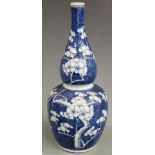 A 19thC Chinese double gourd vase decorated with prunus blossom, four character mark to base, H31cm