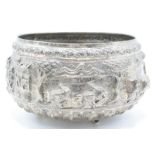 Indian/ Burmese white metal rice bowl with deep relief decoration of pastoral scenes or rice
