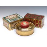 Four biscuit tins comprising Huntley & Palmers brass ship example, two William Crawford examples and