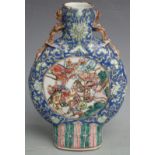 A 19thC Chinese moon flask with figural decoration and dragon handles, H 24cm
