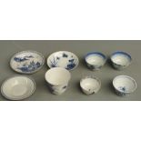 Eight items of Chinese and Japanese blue and white ceramics comprising three dishes and five tea