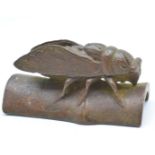 Japanese bronze depicting an insect on bamboo, to underside scorpion and snail, 6.5 x 3.5cm