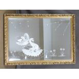 A bevelled glass mirror with engraved swan decoration, 71 x 102cm