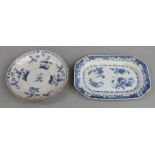 Two 19th/ 20thC Chinese blue and white dishes both with floral decoration, one 22cm in diameter, the