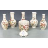 Five Zsolnay Pecs vases, jardiniere and an advertising plaque, tallest 26cm
