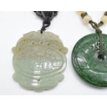 Two Chinese jadeite pendants