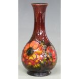 Moorcroft flambé pedestal vase in the Clematis pattern, with Queen Mary paper label and impressed