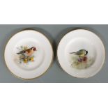 Two Royal Worcester pin dishes hand decorated with Great Tit and Goldfinch, both signed Powell,