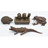 Four Japanese bronzes, a crocodile, frog, hedgehog, and pigs at a trough, three marked to base,