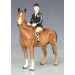 Beswick huntswoman on a brown horse, H22cm