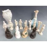 A group of Heredities and other classical style figures and an Art Nouveau style Portuguese lustre