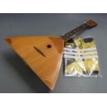 Russian made mid-century balalaika with parquetry decoration to table, label inside with number