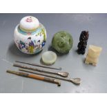 Chinese ginger jar, serpentine puzzle ball and two totems and bombilla straws