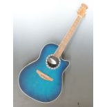 Applause Ovation composite bodied Electroacoustic guitar model No. AE28 with round back, with padded