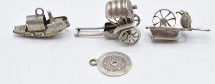 Four Chinese white metal charms