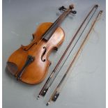 Violin c1920 and two bows, all unlabelled, the violin with 35cm two-piece back, in original case