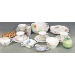 A collection of Shelley porcelain including trios, cake plates, pedestal bowl, toast rack, mustard