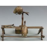 An Eastern Ashanti style desk pen stand with inkwell with animal decoration and engraved well, 18.