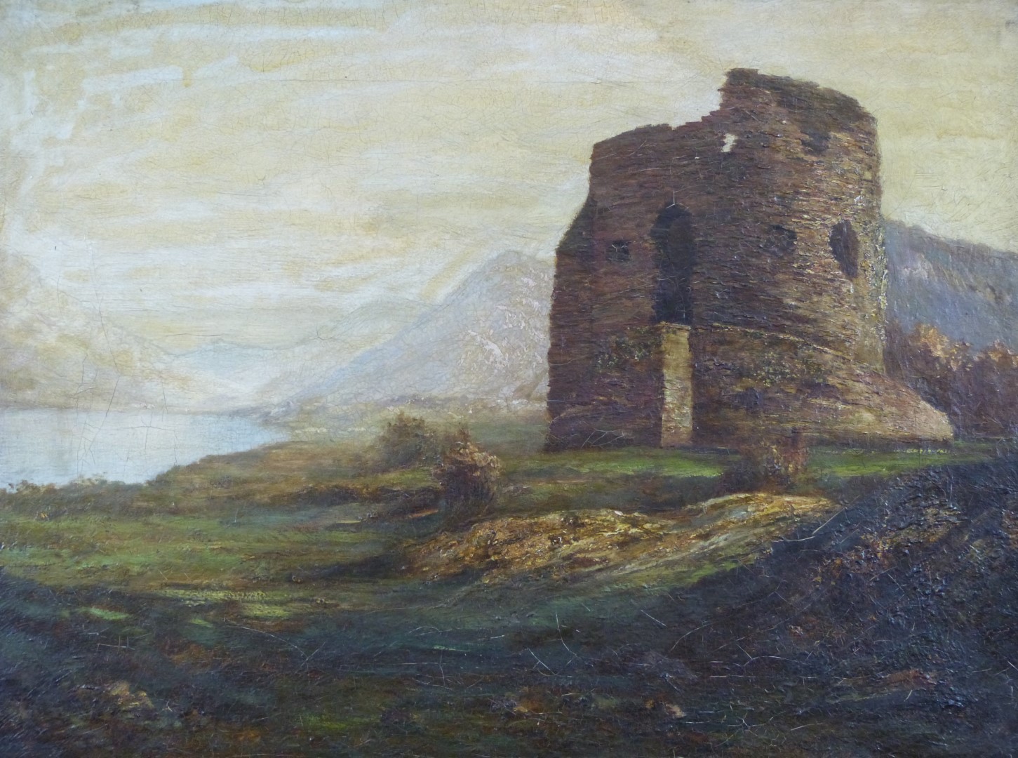 19th/early 20thC oil on canvas ruined castle with Scottish loch or similar beyond, 40 x 55cm, in