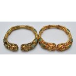 Two Chinese gilt bangles depicting dragons