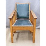 Arts and Crafts oak upholstered adjustable arm or steamer chair