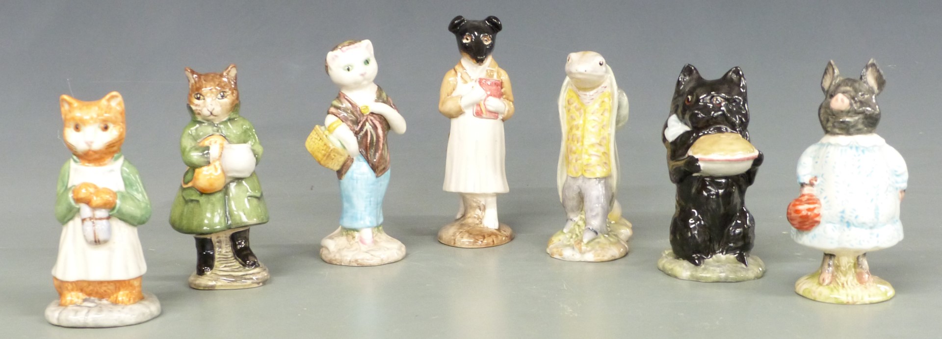 Seven Beswick Beatrix Potter figures including Susan, Duchess with Pie, Ginger, Pickles, Sir Isaac