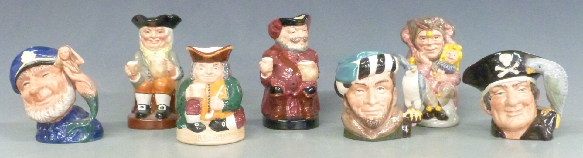 A collection of Royal Doulton small character and Toby jugs including Jester, Winston Churchill, two - Image 2 of 4