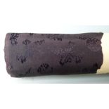 A roll of Chinese silk in original paper packaging together with three Chinese embroidered panels,