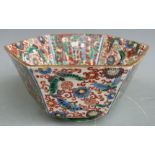 A late 18th/19thC Chinese octagonal pedestal bowl with enamelled figural and botanical decoration