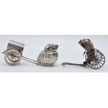 Chinese silver pepper in the form of a chick with character marks to base, L5cm, and two silver