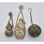 Two Chinese bottles to attach to a chatelaine and a Chinese pierced ball