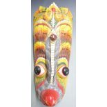 Four masks, probably Indonesian, tallest 47cm