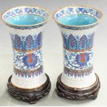A pair of Chinese cloisonné vases on hardwood stands, H18cm