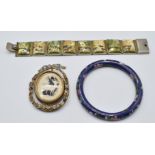 A white metal bracelet set with painted mother of pearl panels, a cloisonné bangle and a Victorian