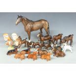 A collection of Beswick foals, dogs and birds