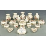 A collection of Zsolnay Pecs porcelain including trinket boxes, dishes, Zsolnay advertising sign,