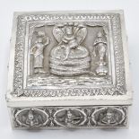 Indian white metal box with embossed deity and coiled cobra snake decoration, 9.8 x 9.8 x 4cm