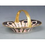 Royal Crown Derby Imari 1128 pattern basket with gilded handle, W28 x D20.5 x H15cm