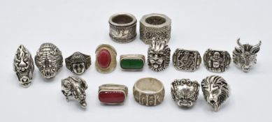 Two Chinese archer's rings, and fourteen Chinese rings